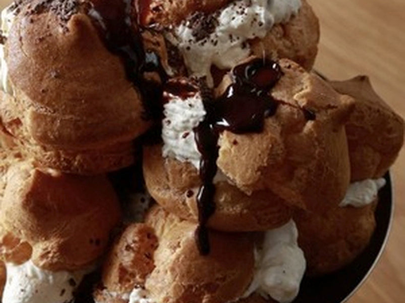 Profiteroles and chocolate pavlova